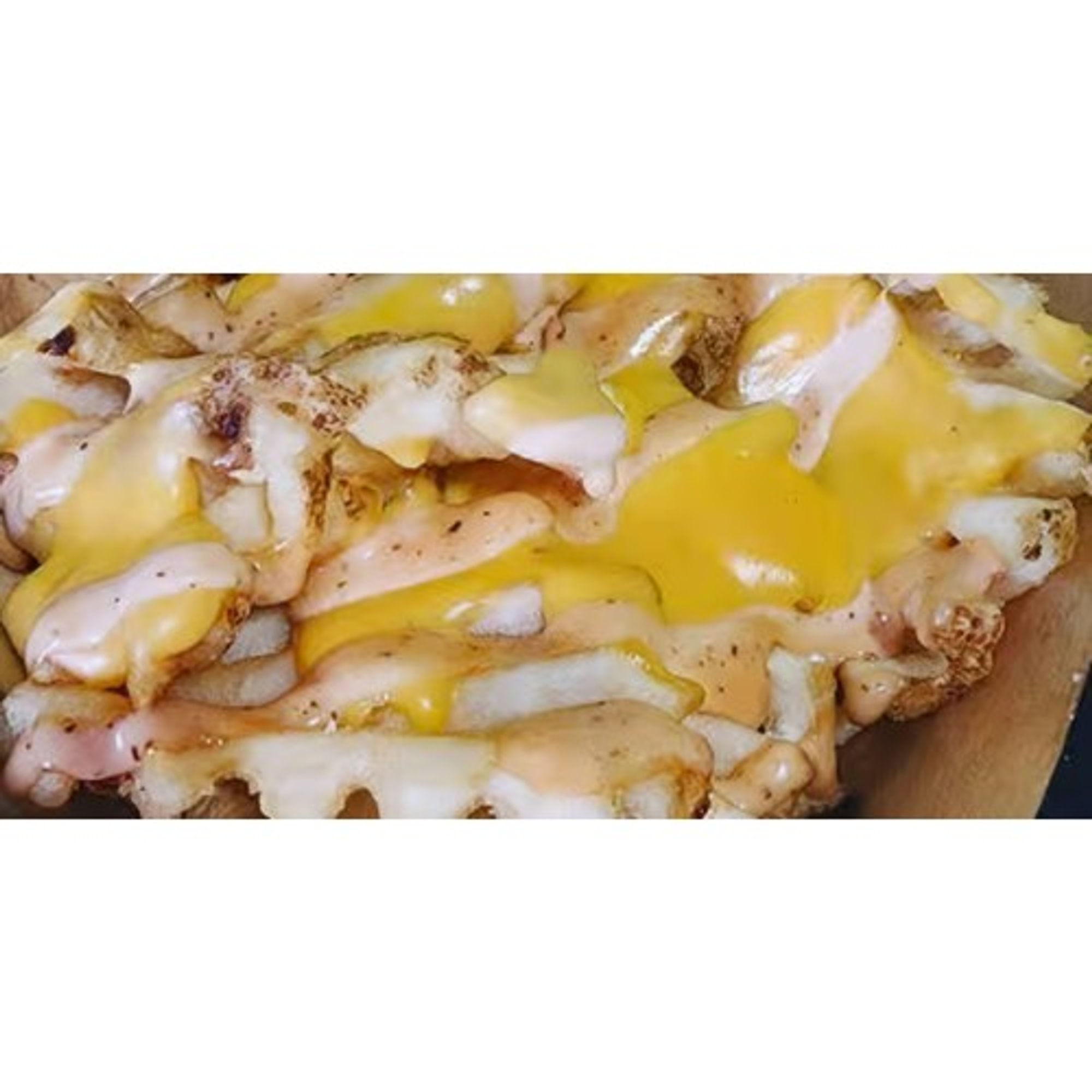 Loaded Waffle Fries with Bacon, Chicken, or Ground Beef
