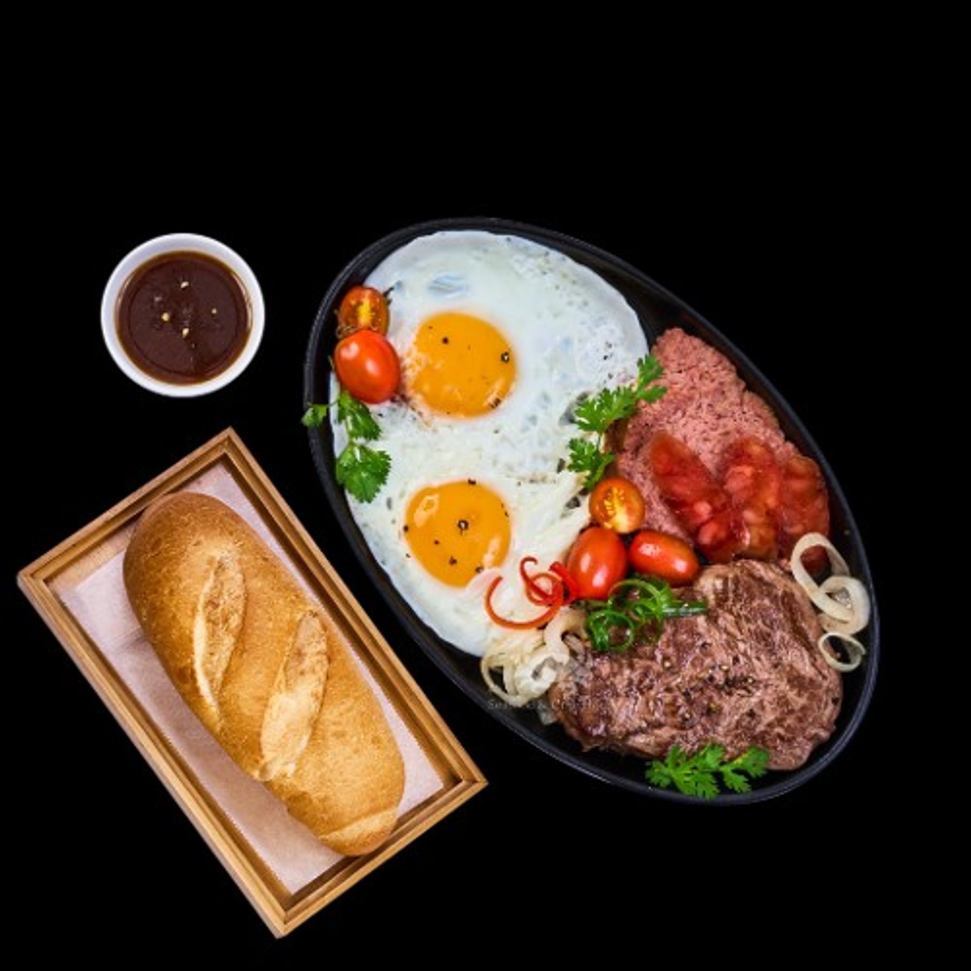 Bò Né / Beef Filet Mignon, Eggs, and Pate on Sizzling Plate