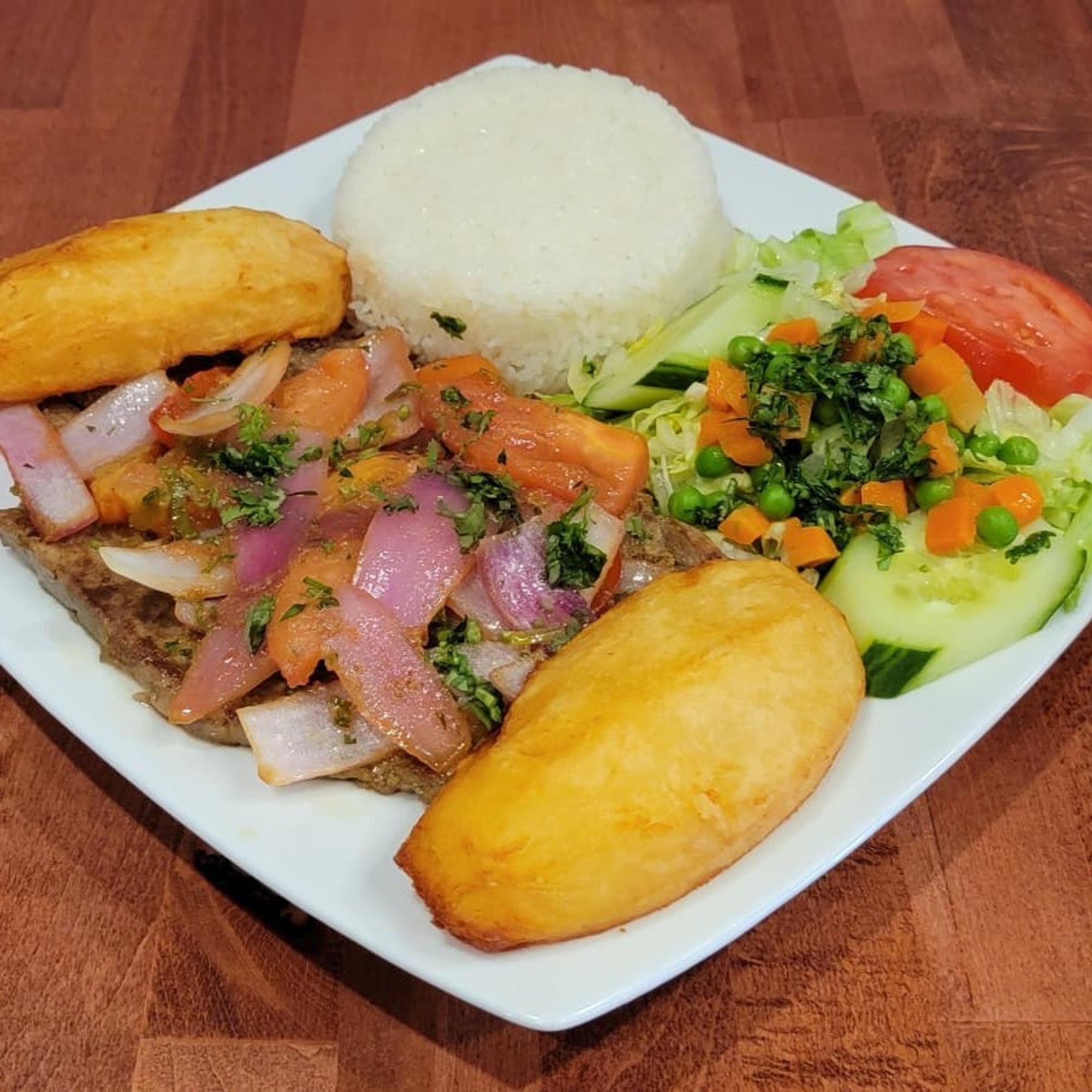 Bistec Encebollado