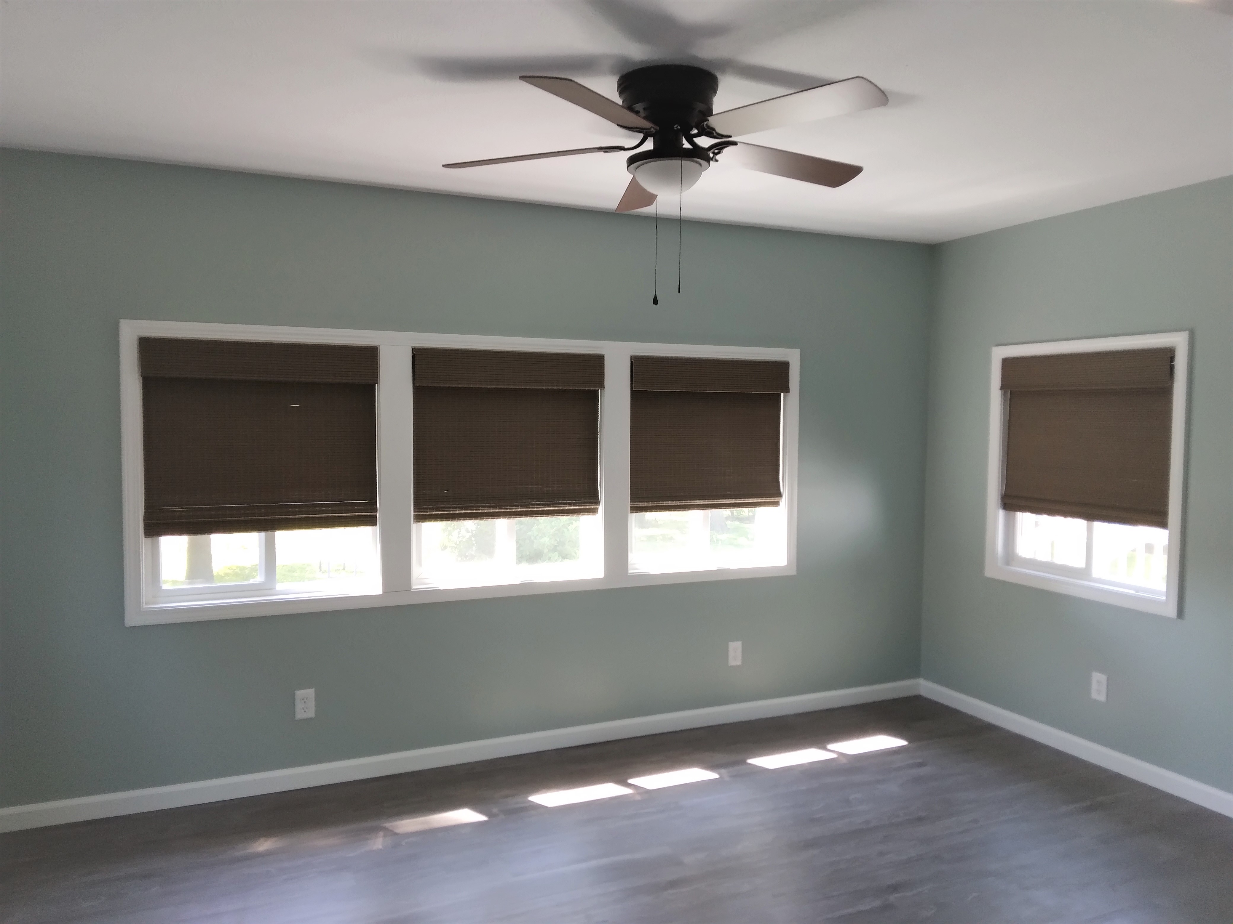 Cordless natural shades in Springfield Illinois sunroom.  BudgetBlinds  WindowCoverings  Shades  NaturalShades  SpringfieldIllinois