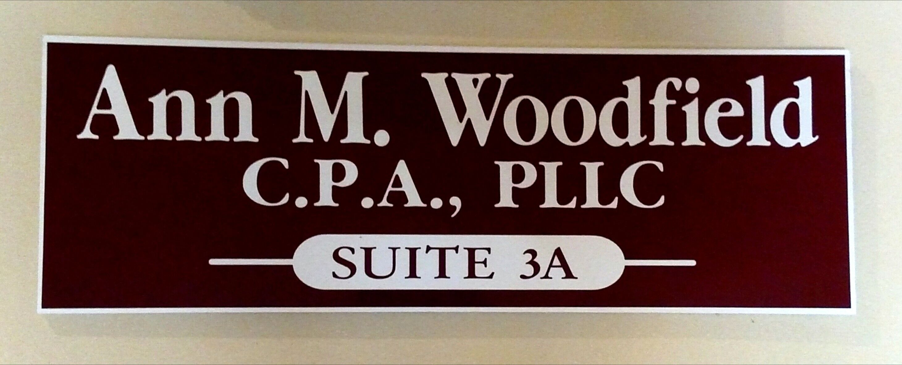 Ann M Woodfield CPA PLLC Logo