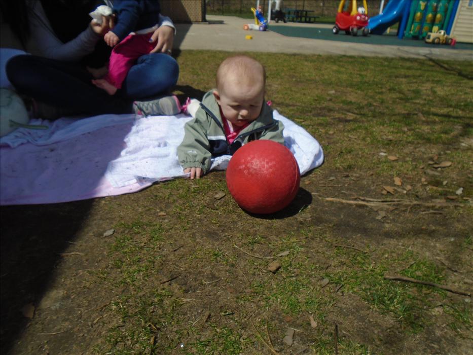 This is Ella one of our infants practicing tummy time outside on a beautiful day.