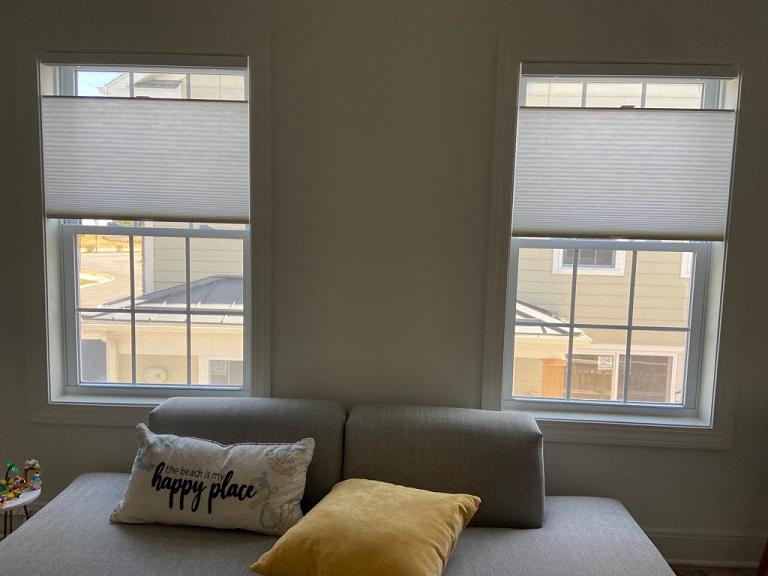 Truly make your home in Latham your happy place with our Top-Down, Bottom-Up Honeycomb Shades that can be adjusted conveniently based on your needs.