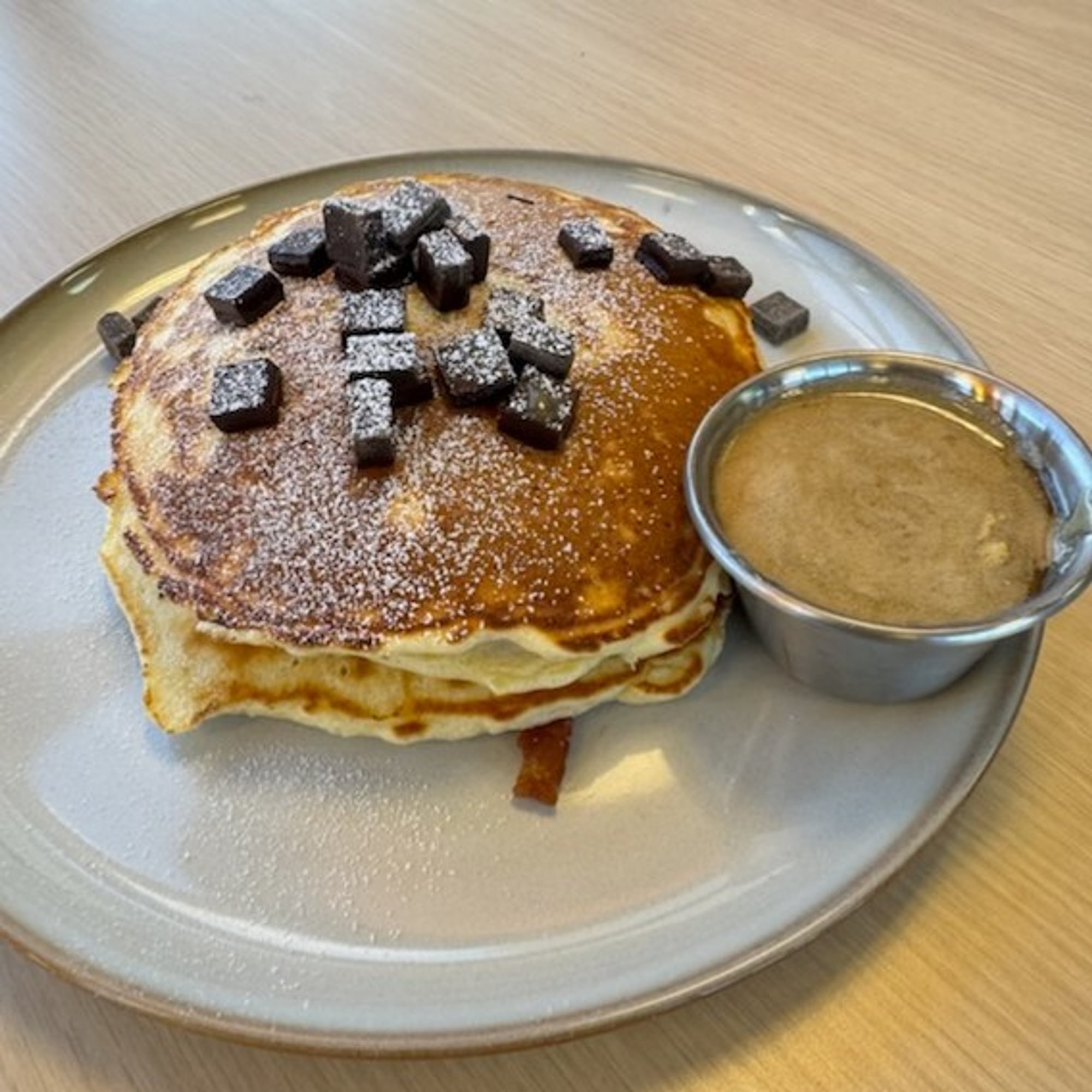 3 CHOCOLATE CHUNK PANCAKES Served with/Maple Butter
