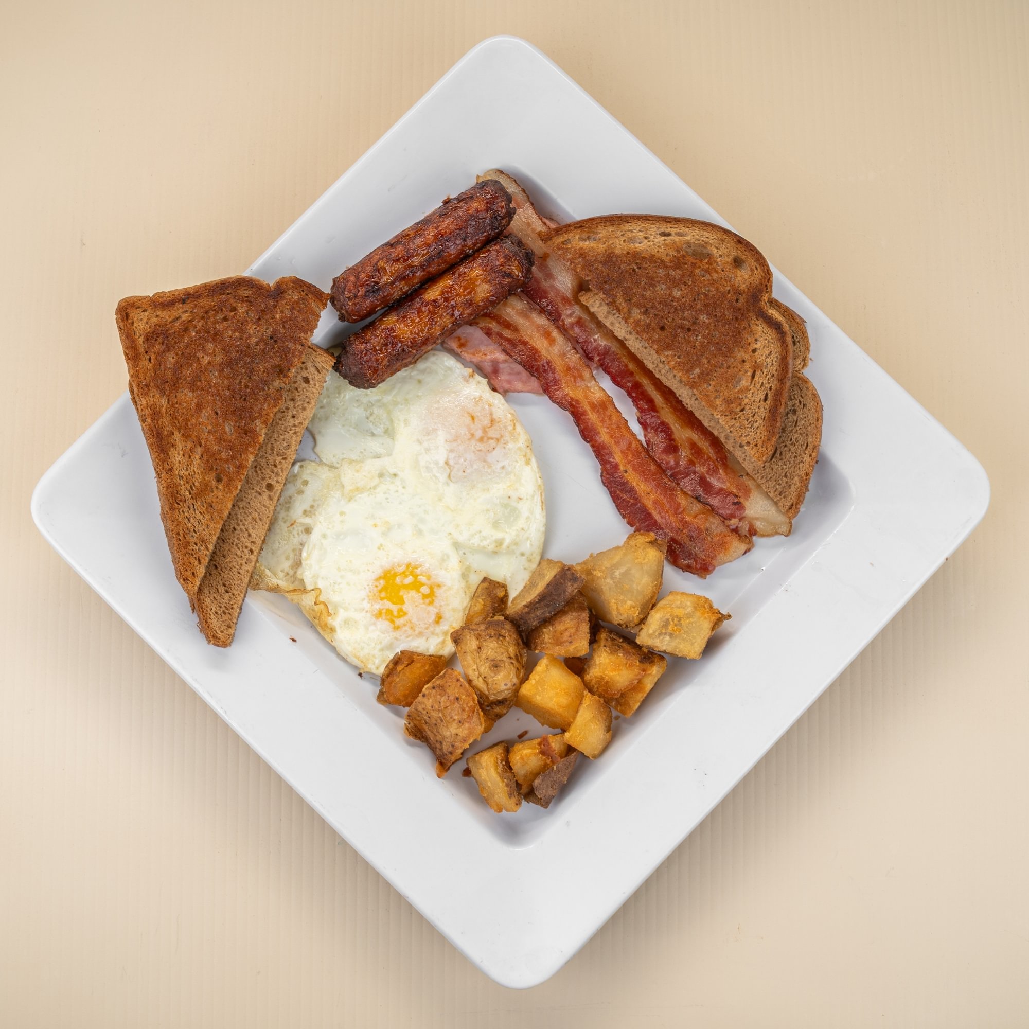 2 Eggs w/ Bacon, Ham, Sausage