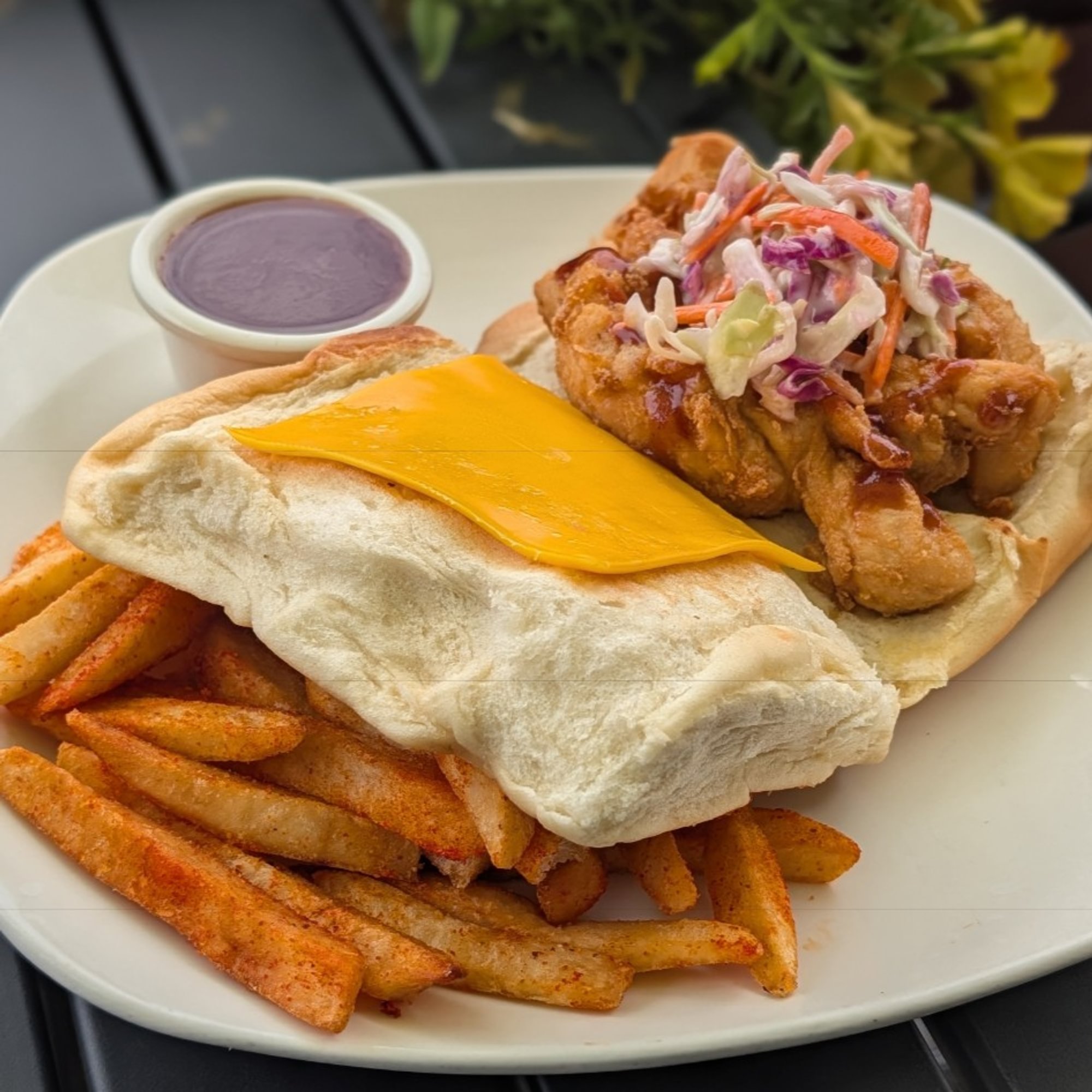 Jamaican fried chicken coco bread sandwich