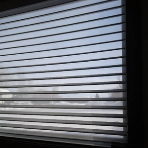 Pinedale Glass has let us cover a few windows to help you see what we can do. We put in an Enlightened Style Window Shading blind with a power wand to give you, our customers, the opportunity to check them out.