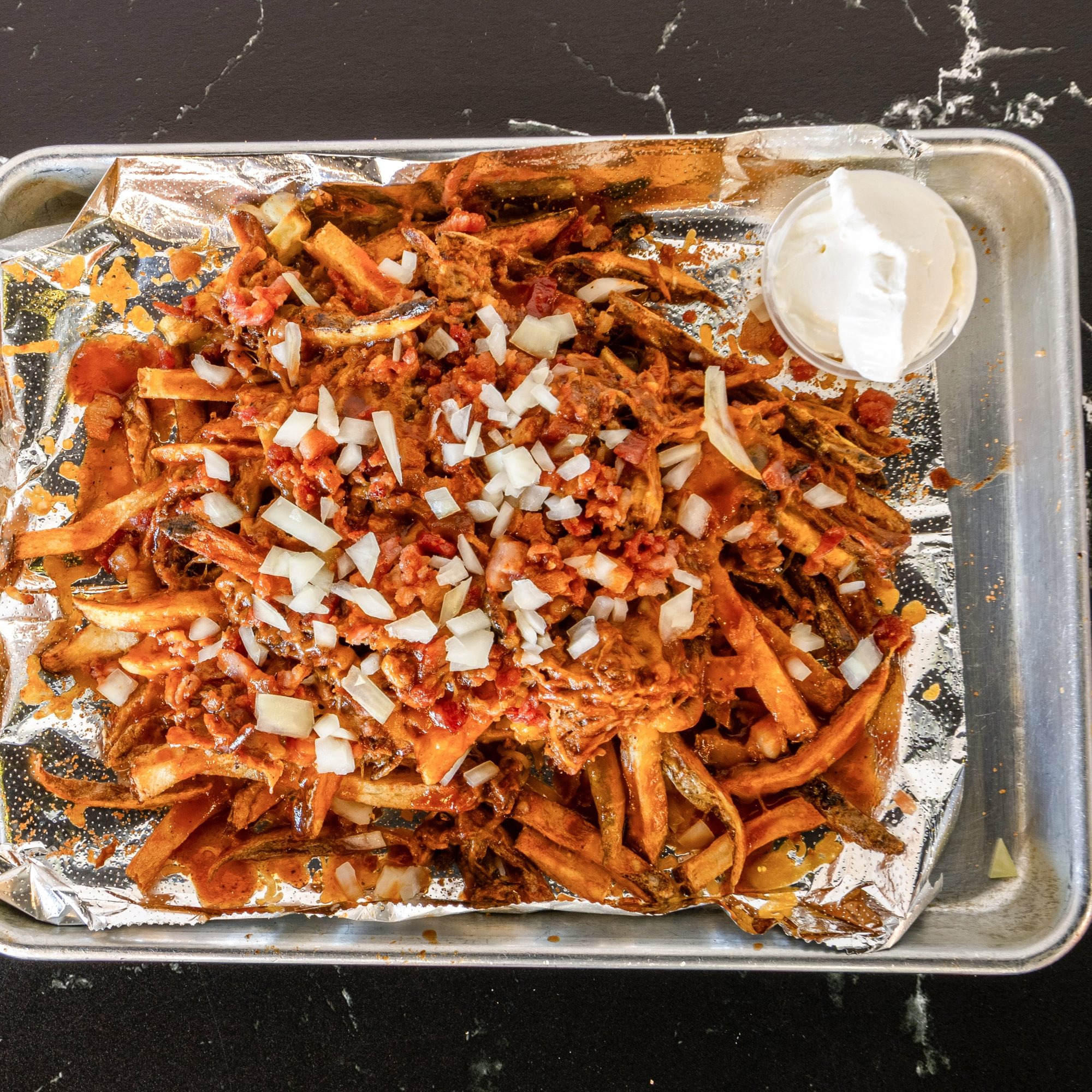 Fresh Cut Fries, Cheese, Bacon and Bbq Sauce, add your Meat
