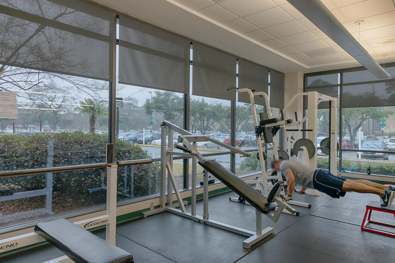 These solar shades keep the Wellness Center cool for those afternoon workouts without blocking the view to the outdoors.