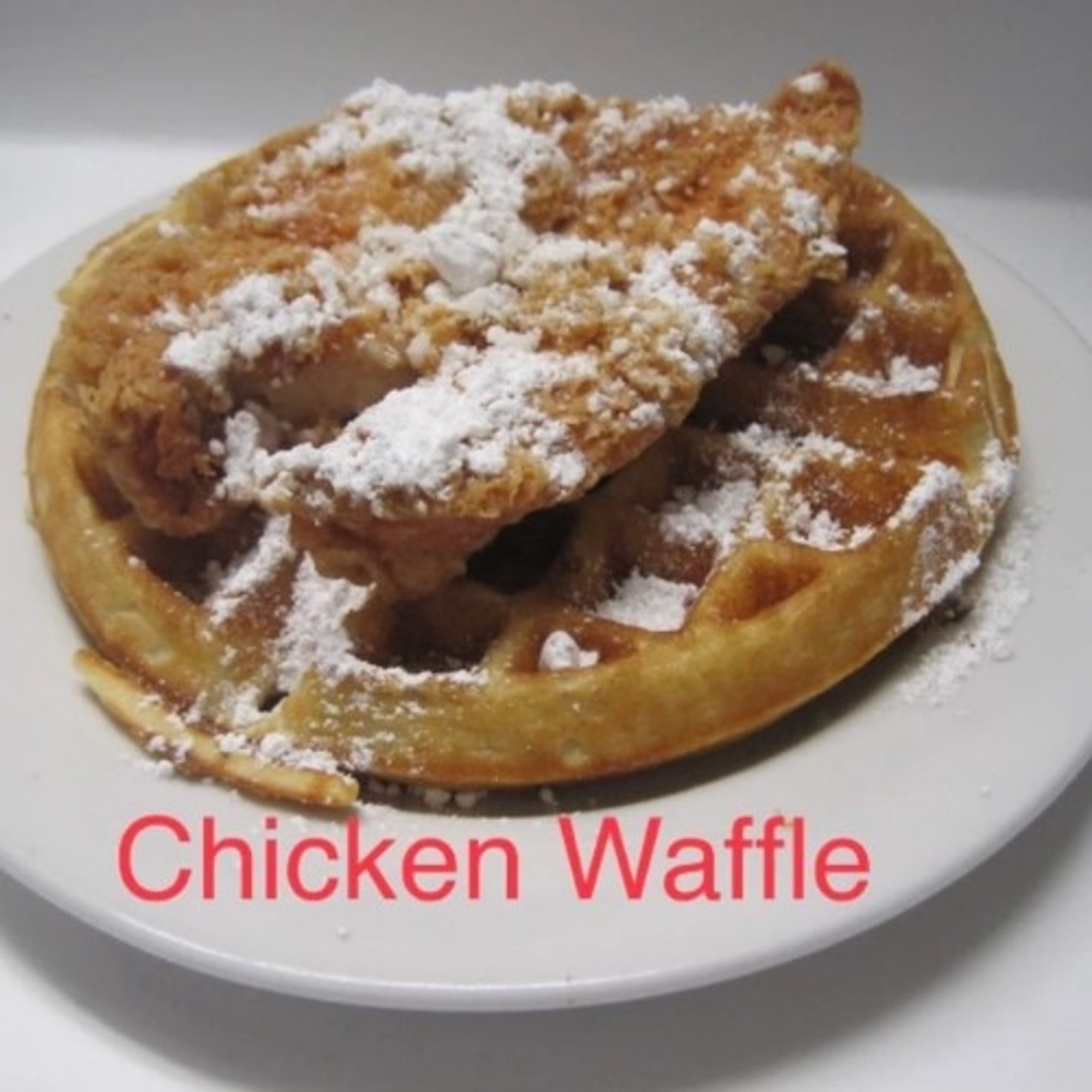 Chicken Waffle Dusted with Powdered Sugar