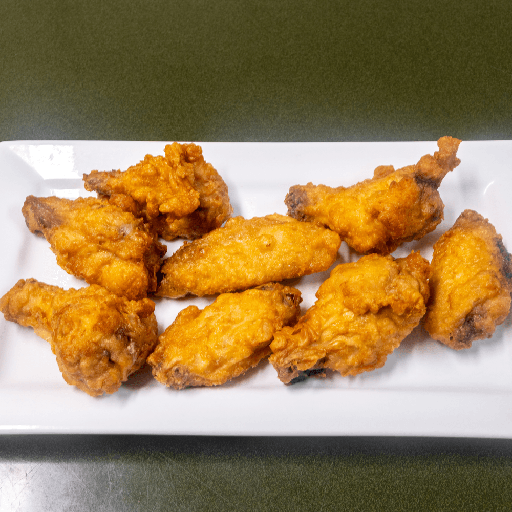 L25. Fried Chicken Wing with Honey, Sesame or General Tsao's Sauce