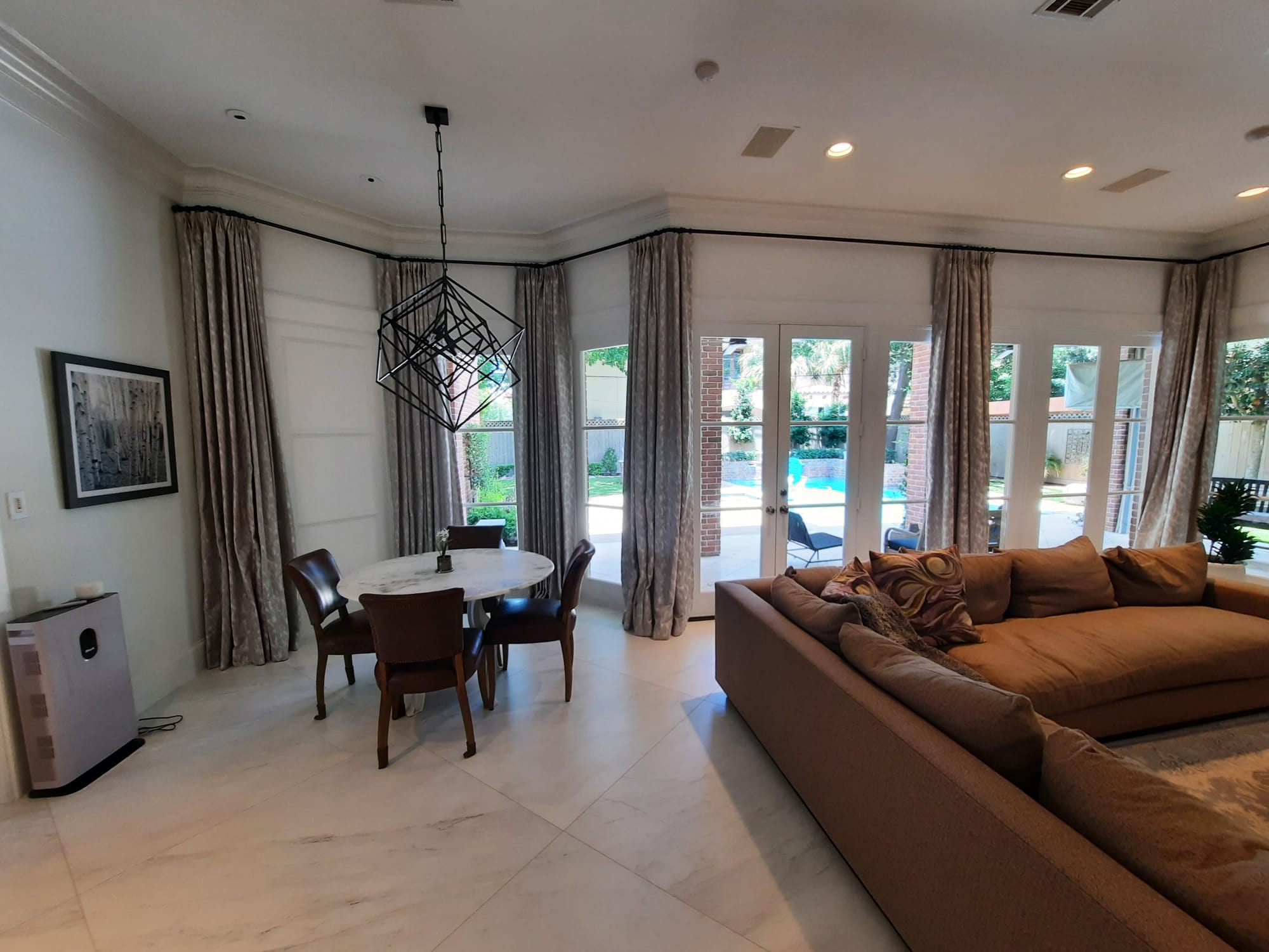 Just installed some beautiful Custom Drapery Panels from Horizons in Allegra Silver fabric. Updated with Crown / French pleats and iron rod /rings to compliment the clients elegant, modern home.