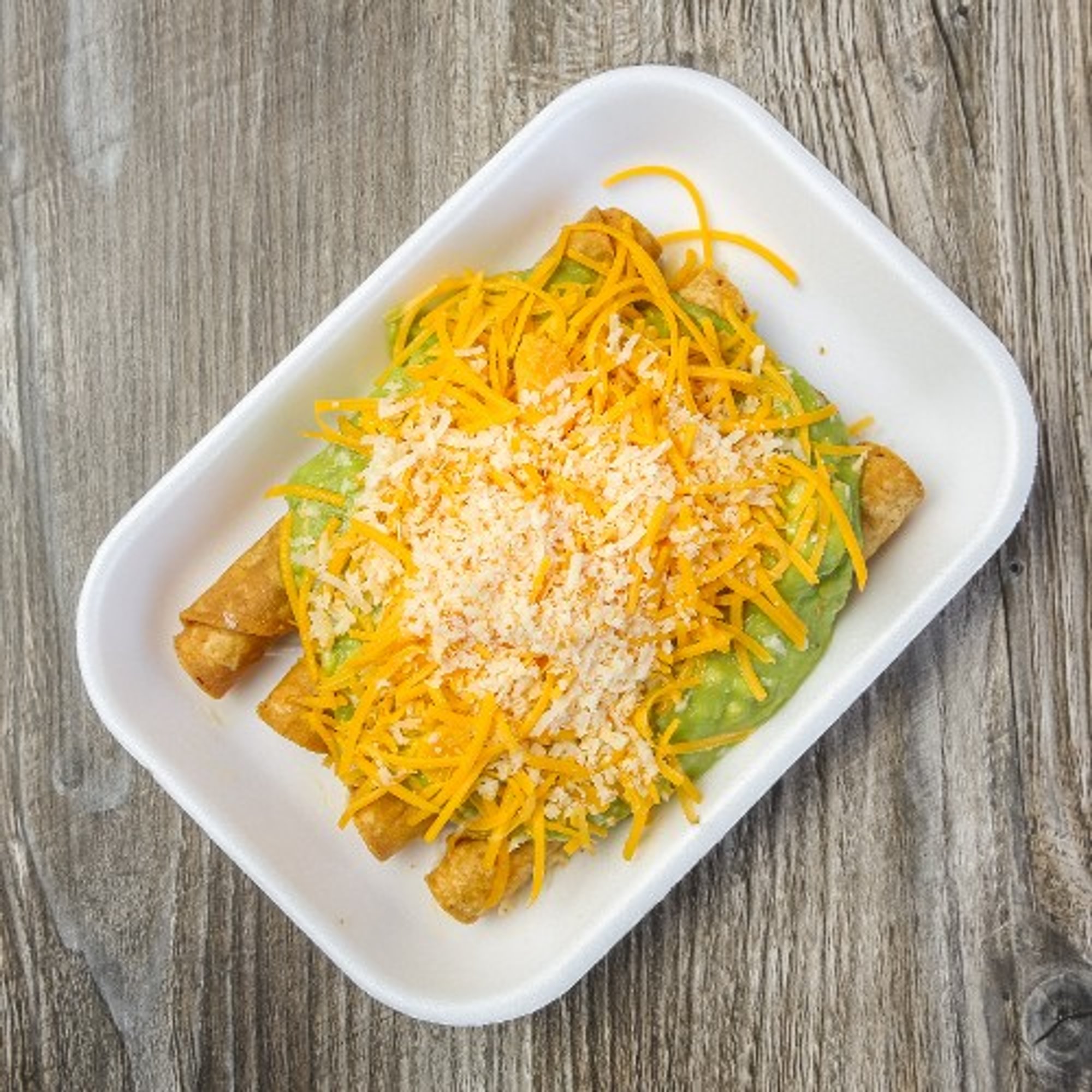 12 CHKN ROLLED TACOS GUACAMOLE
