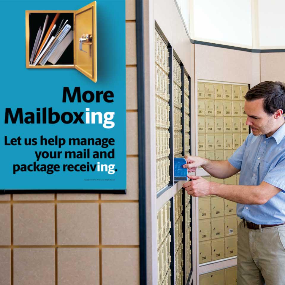 man getting mail from his private mailbox at the ups store