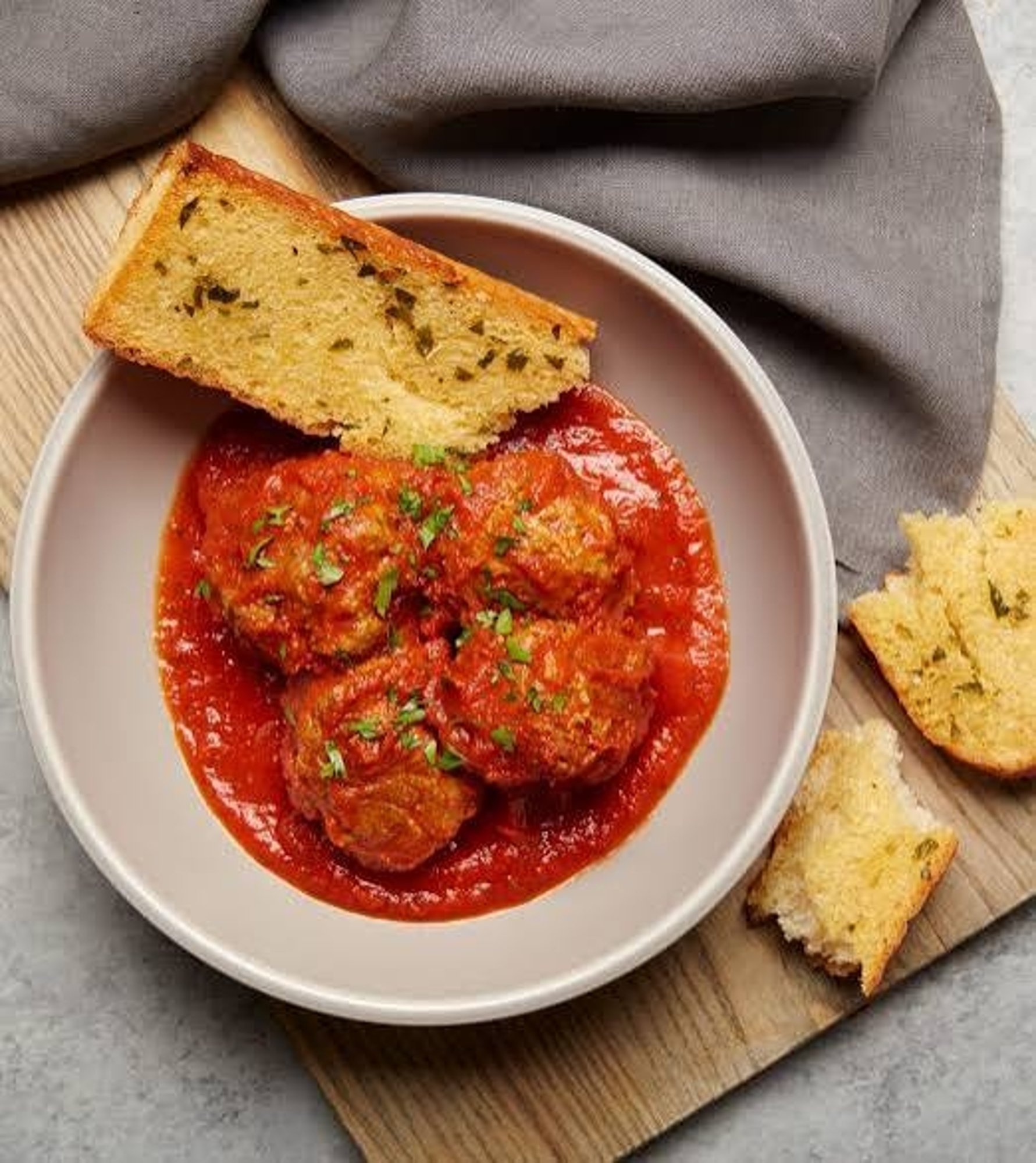 BAKED MEATBALLS (4) & GARLIC BREAD