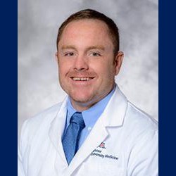 Travis Hughes, MD
