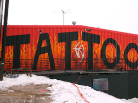 Quality Ink Tattoo and Piercing Studio Logo