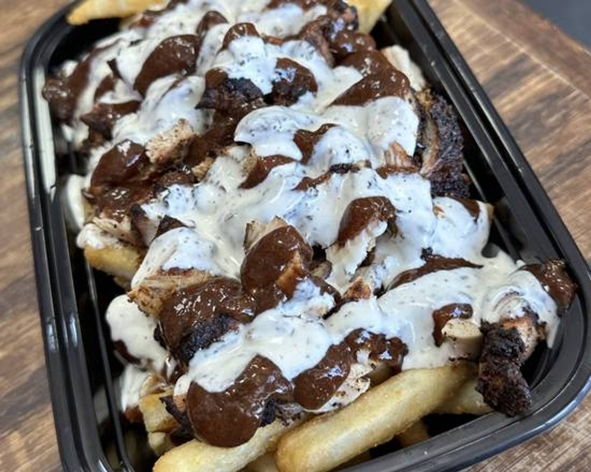 Jerk Chicken Over Fries