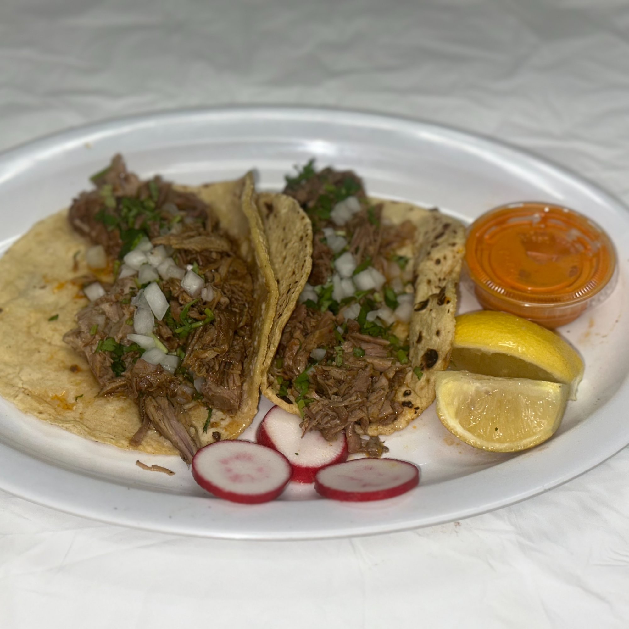 2 Tacos de Birria con Consome