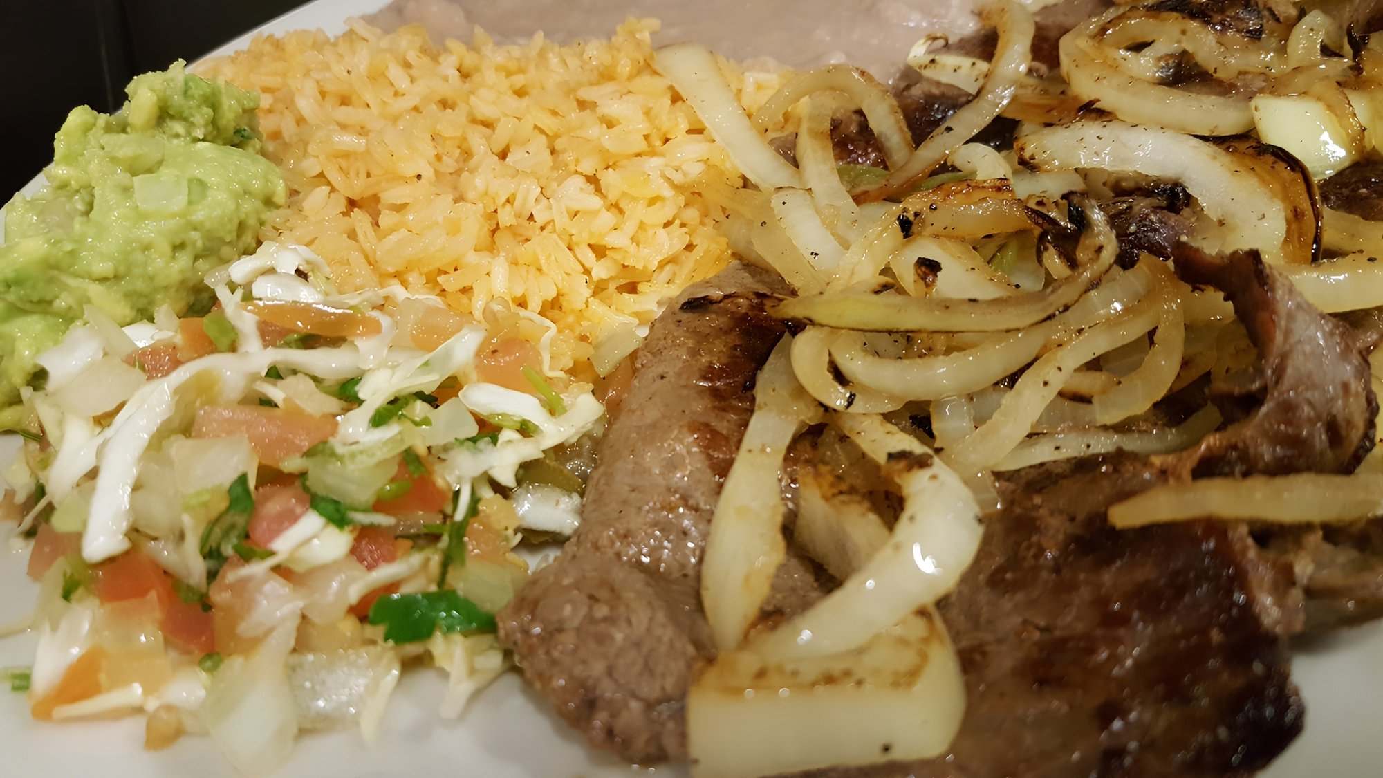 Bistec Encebollado