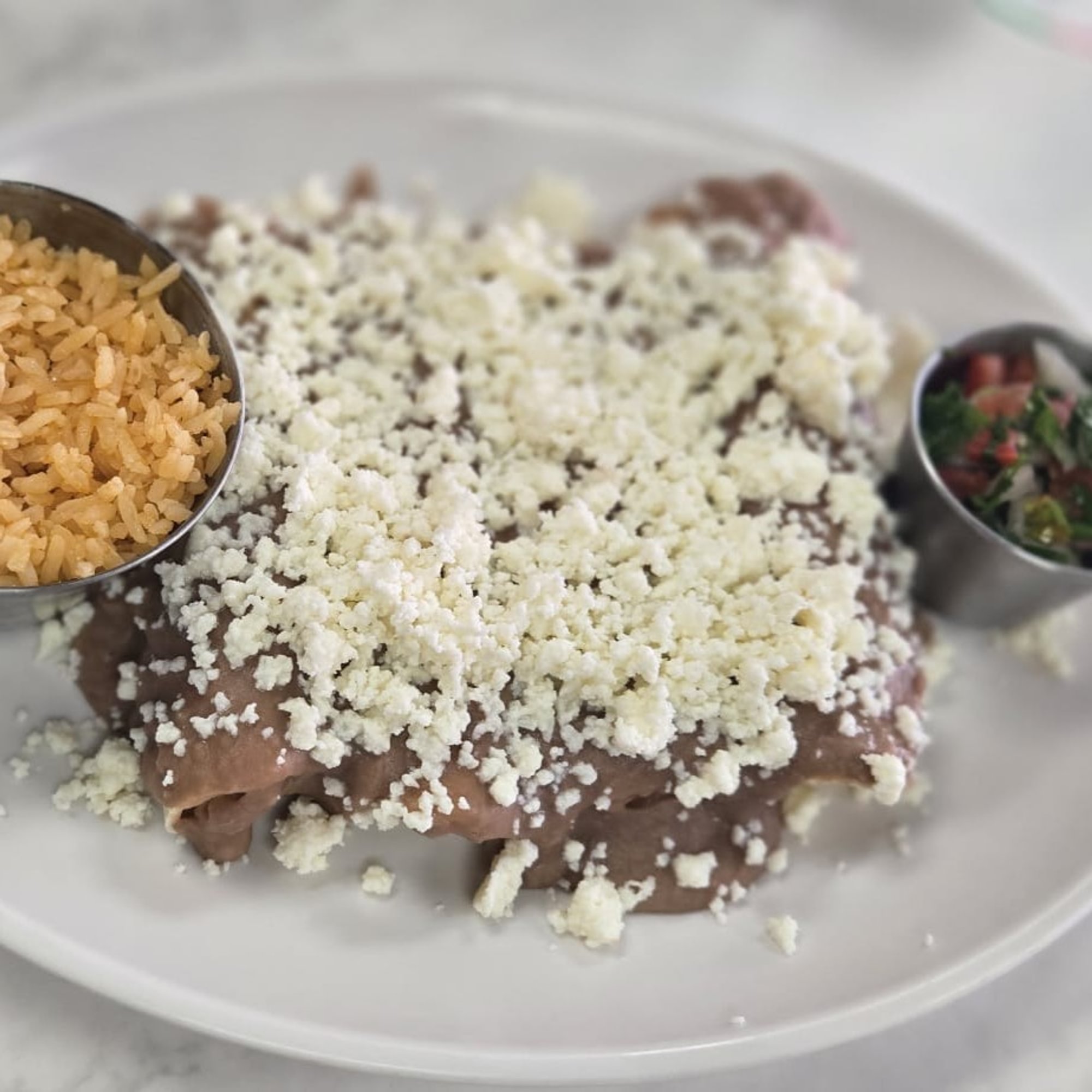 Enfrijoladas Queso Fresco