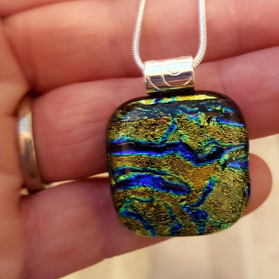 Holistic glass Pendant, chatged with positive Reiki energy.  Hand crafted, kiln fused. sterling silver plated bail and chain.  $20