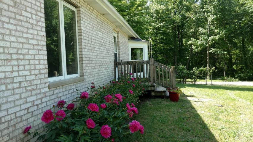 Very spacious solid brick home on 1.6 acres. Large bedrooms and large unfinished basement with lots of options. Close proximity to down town Delton but with a serene country feel! Home is situated on a paved rd,Fresh paint in a number of rooms and large kitchen awaits!! So many options here!!!! Roof Was redone in 2011 and is constructed to last with heavy-heavy--duty felt and shingles. New well in 2014--4'' New bradford white-water heater in 2014.