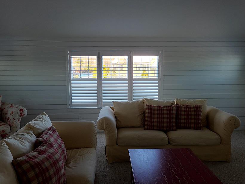 These timeless Plantation Shutters look right at home in this living room is Rutland, MA! These windows coverings are great at giving you privacy, whilst allowing the natural light through - plus they look good! It's no wonder these are so popular.  BudgetBlindsWorcesterHolden  WindowWednesday  Free