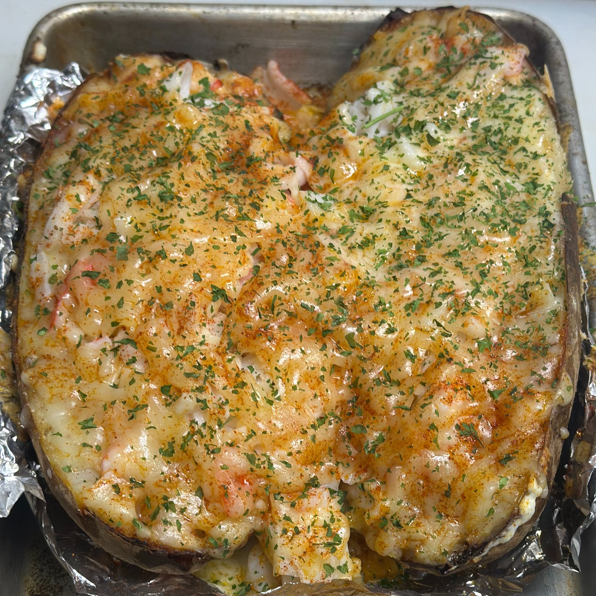 Seafood loaded baked potatoes