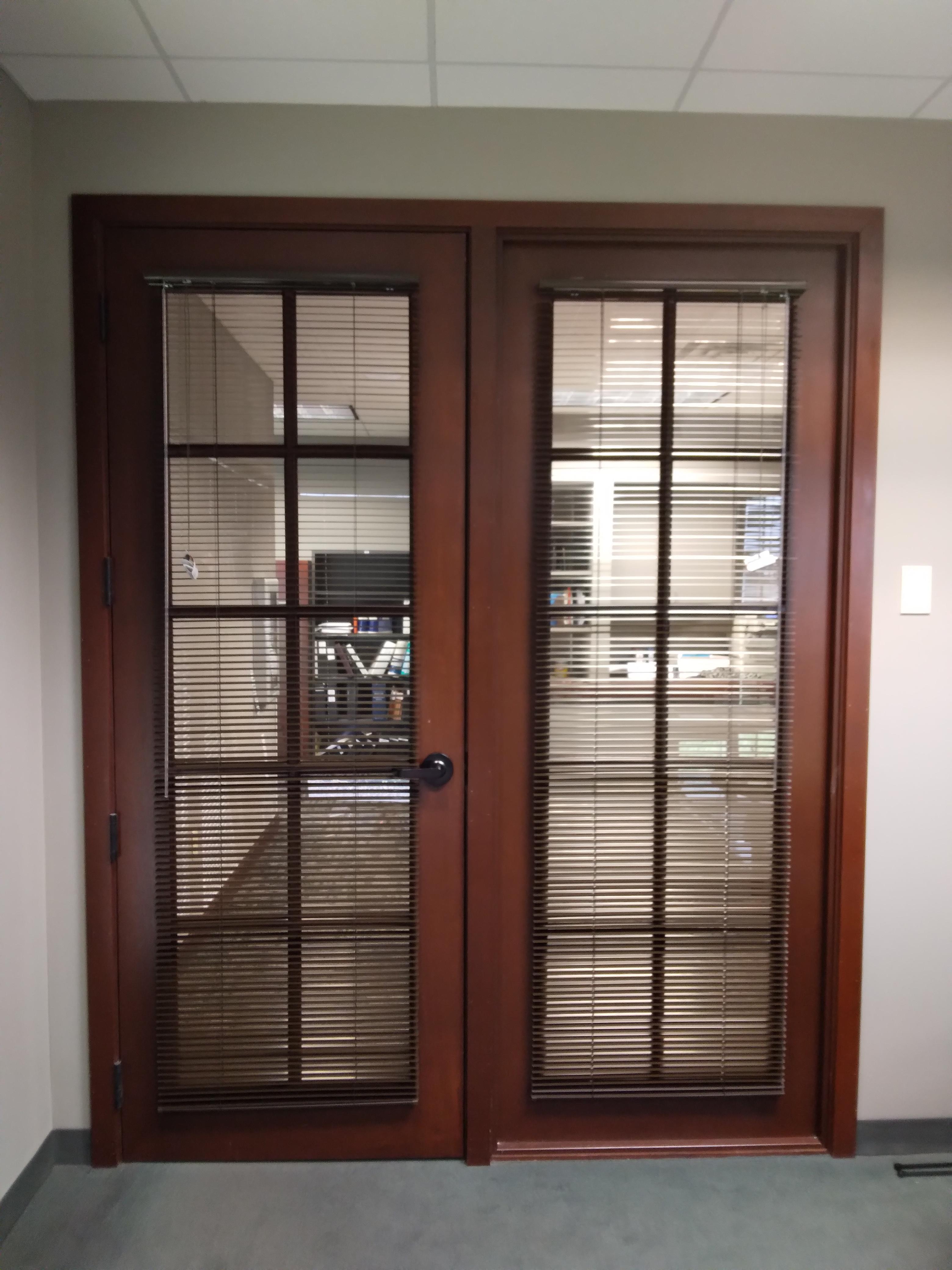 These aluminum mini blinds were added to these Springfield Illinois office doors to provide privacy in the office.  BudgetBlinds  WindowCoverings  Blinds  AluminumBlinds  SpringfieldIllinois