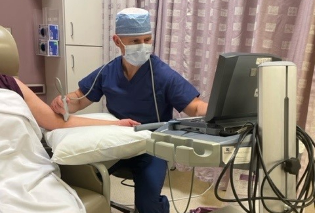 A doctor and patient at Valley Access Center