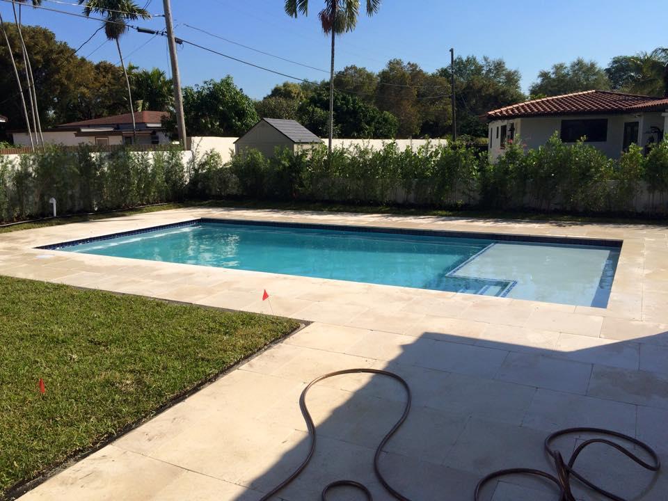 here is a galala tumbled 24x24 paver installed around a pool deck.