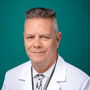 Male neurologist professional headshot.