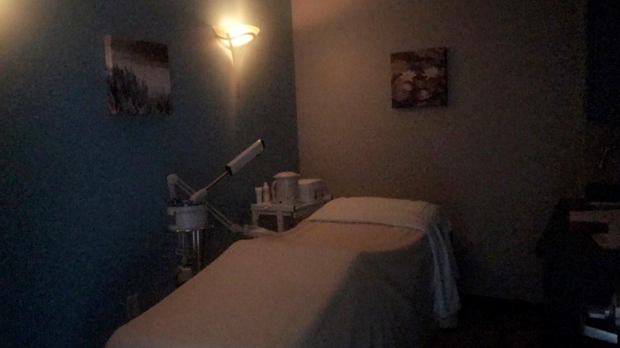 Hand and Stone Massage and Facial Spa Logo