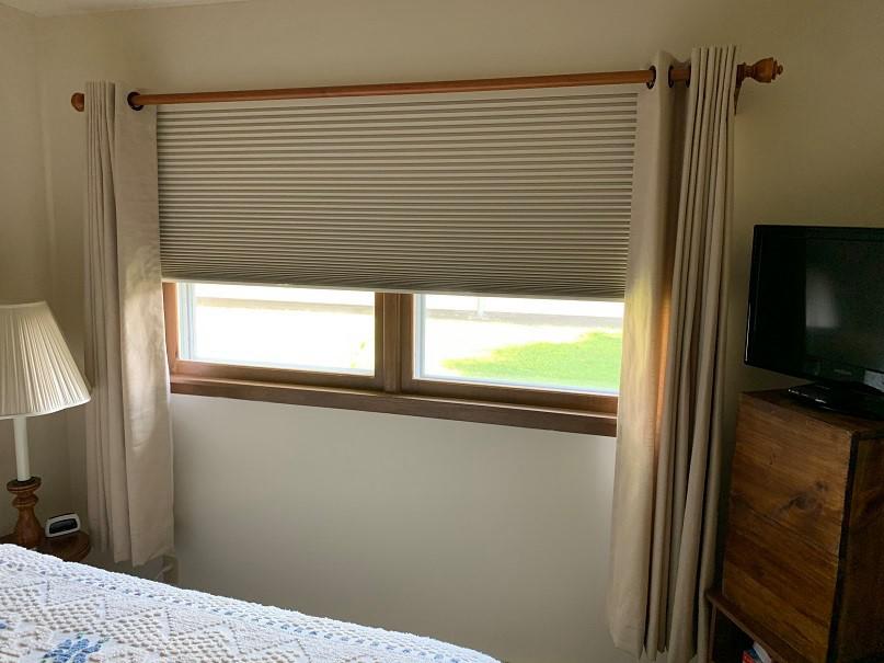 Combine Cellular Shades with Drapery Panels to give your room class and style. The room's added energy efficiency will be a bonus for you to get that perfect nights rest.  BudgetBlindsMankato  FreeConsultation  DraperyPanels  CellularShades  WindowWednesday