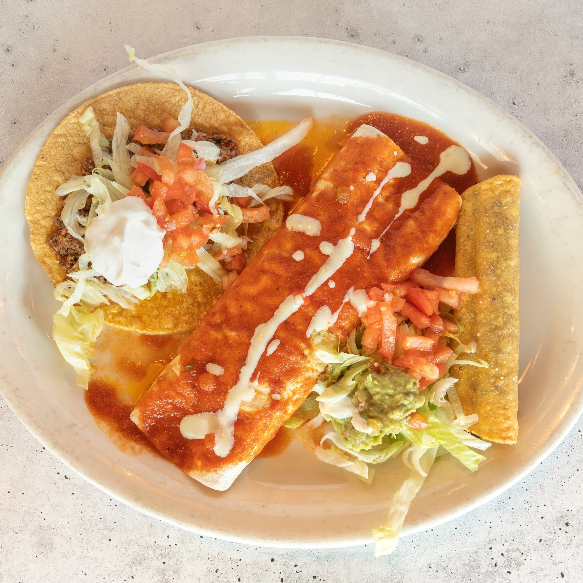 L. One Burrito, One Flauta & One Beef Tostada