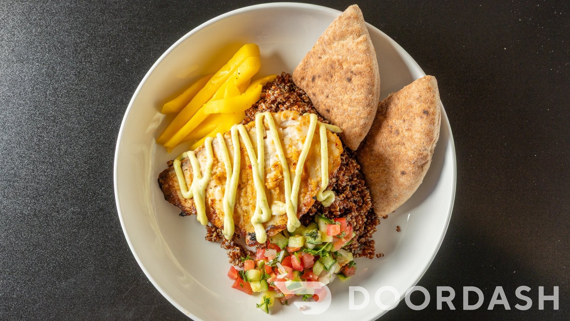 Citrus Grilled Fish Entree, Zhug Mayonnaise, Israeli Salad, Pickled Mango, 1/2 Pita