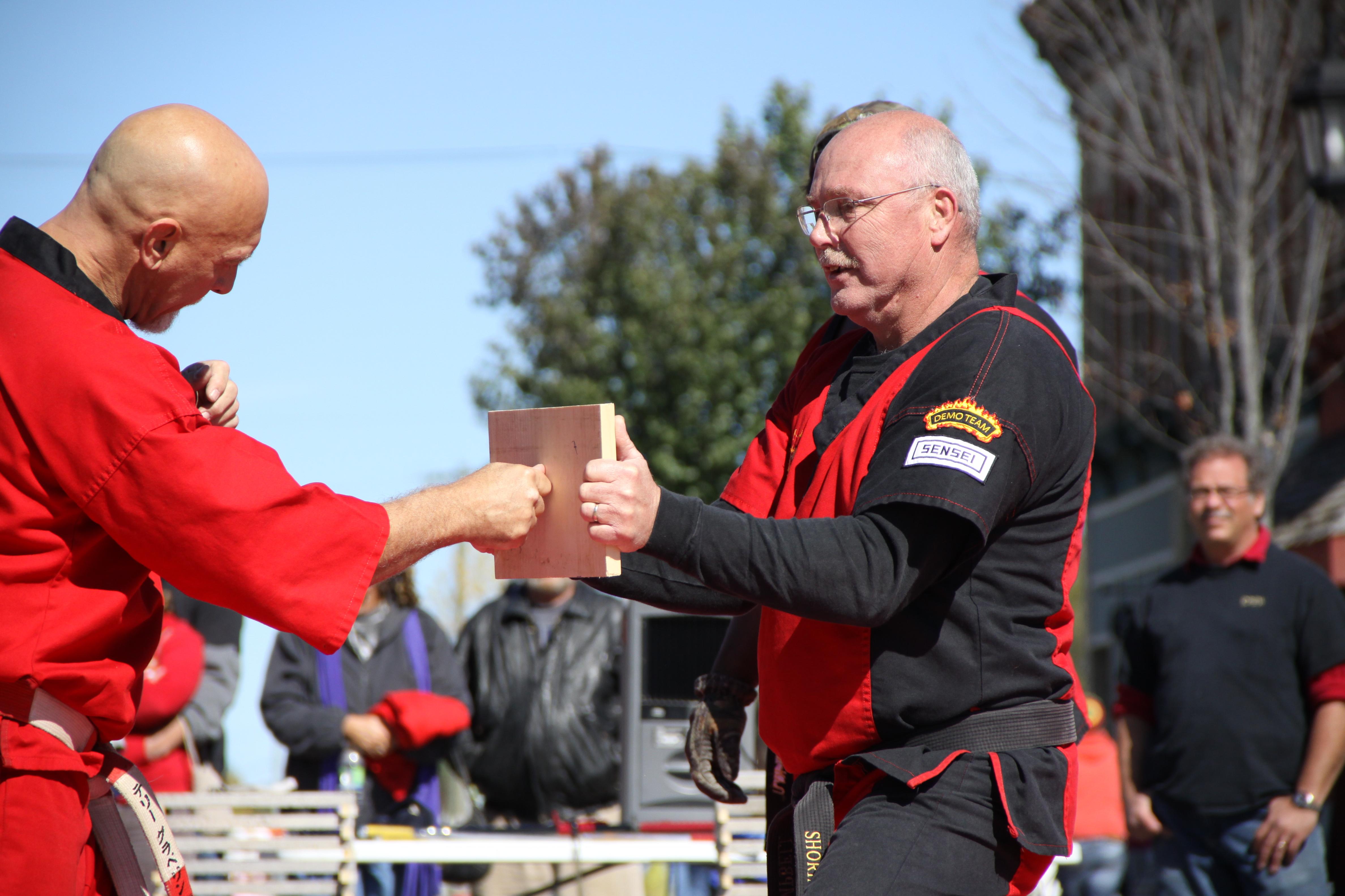 Kyoshi Gravelin breaks a board with his thumb... 2...