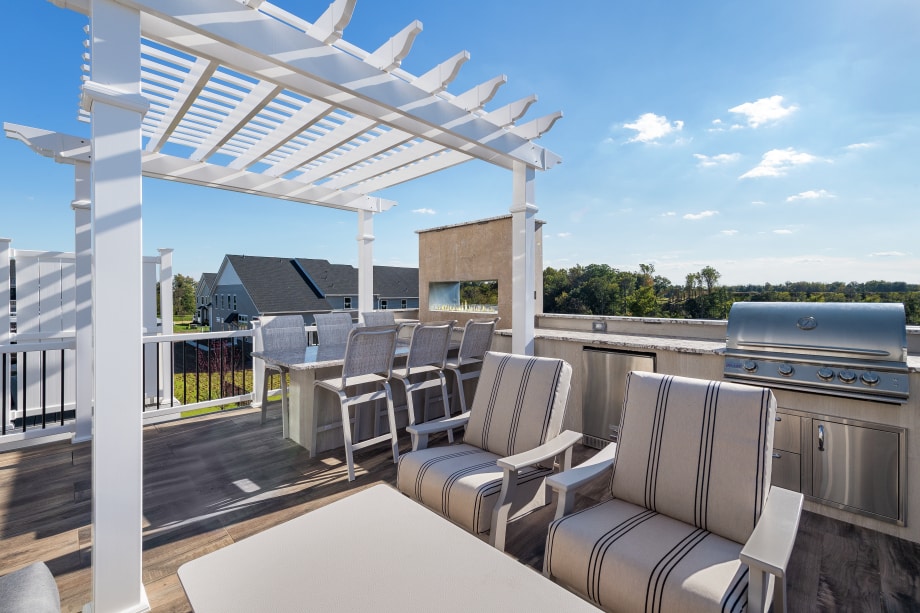 Outdoor living complete with grill and fireplace