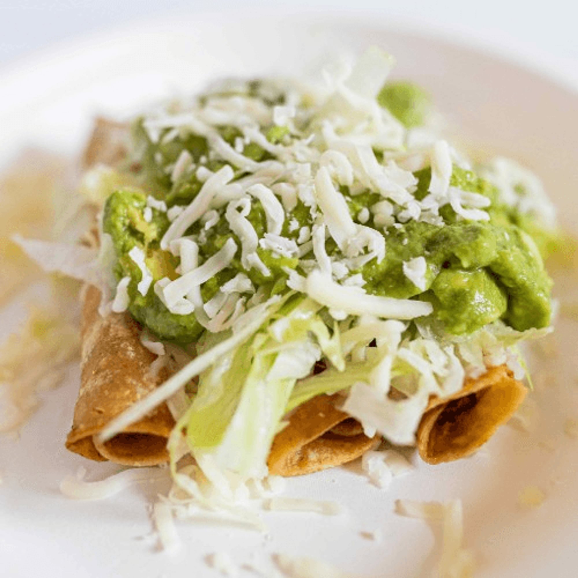 Five Rolled Chicken Tacos