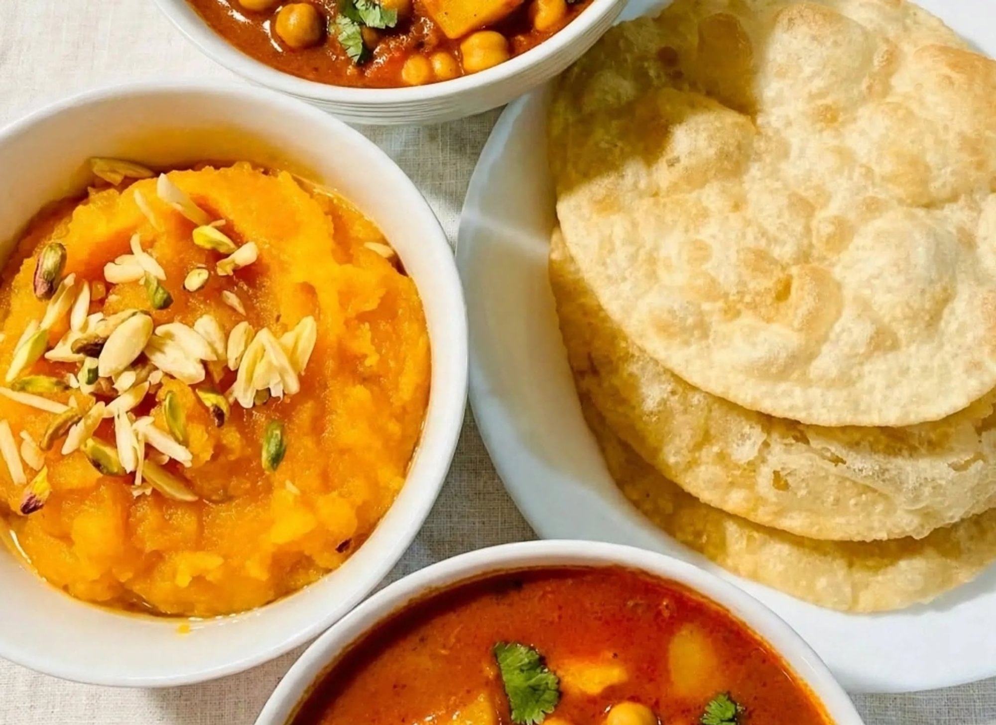 Halwa-Puri Paratha-Aloo Cholay Platter