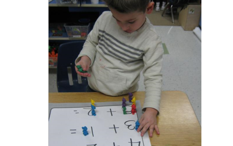 A good portion of our Preschool curriculum focuses on small math concepts. Here our Preschool classroom was identifying numbers while working on one to one correspondence. The children were encouraged to identify each number and utilize our 