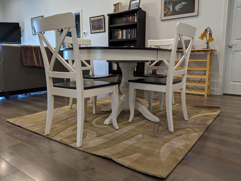 We do more than windows! We created the perfect Dalyn Custom Rug to go in this dining space! Get in touch with us for your own gorgeous floor coverings!