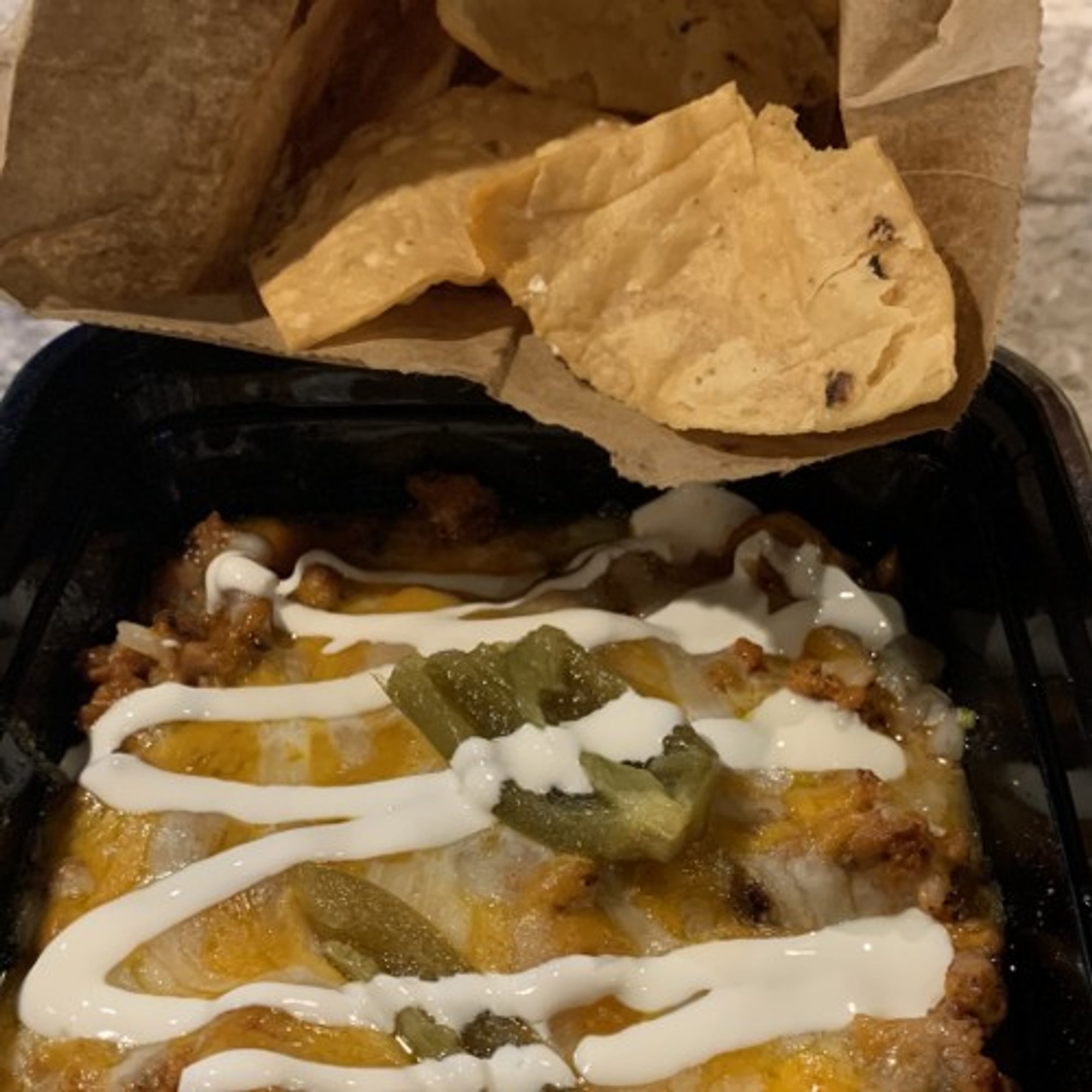 NACHOS WITH SPICY PORK