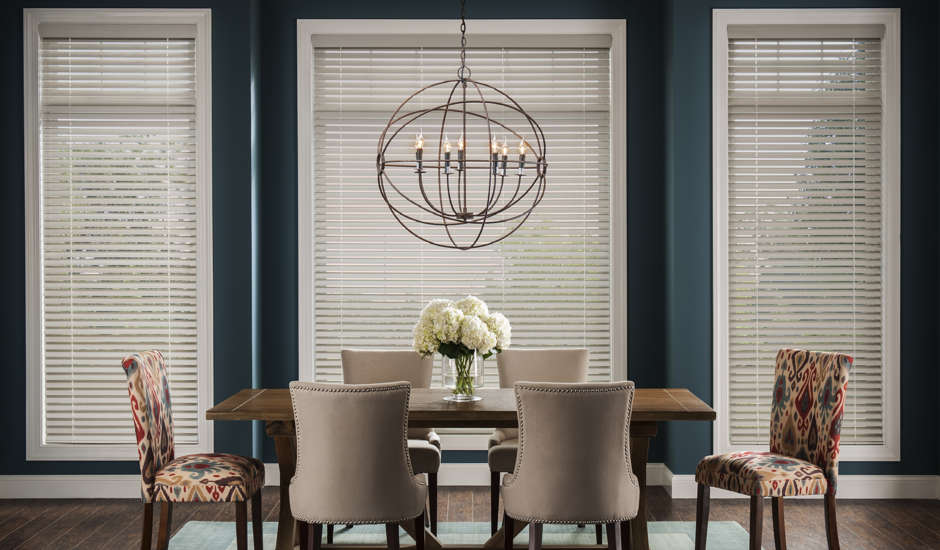 Gorgeous wood blinds in this  coastal Newport dining room. Love!