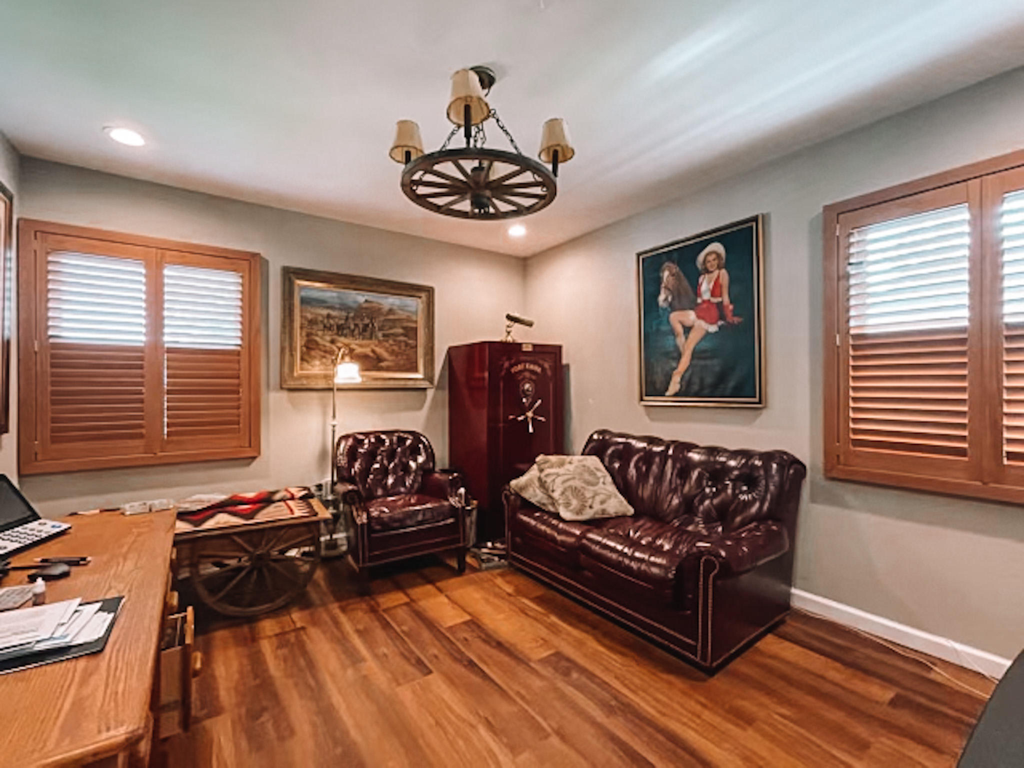 Shutters in a natural wood shade to bring together the rustic/western feel of this office in Morganville, NJ.