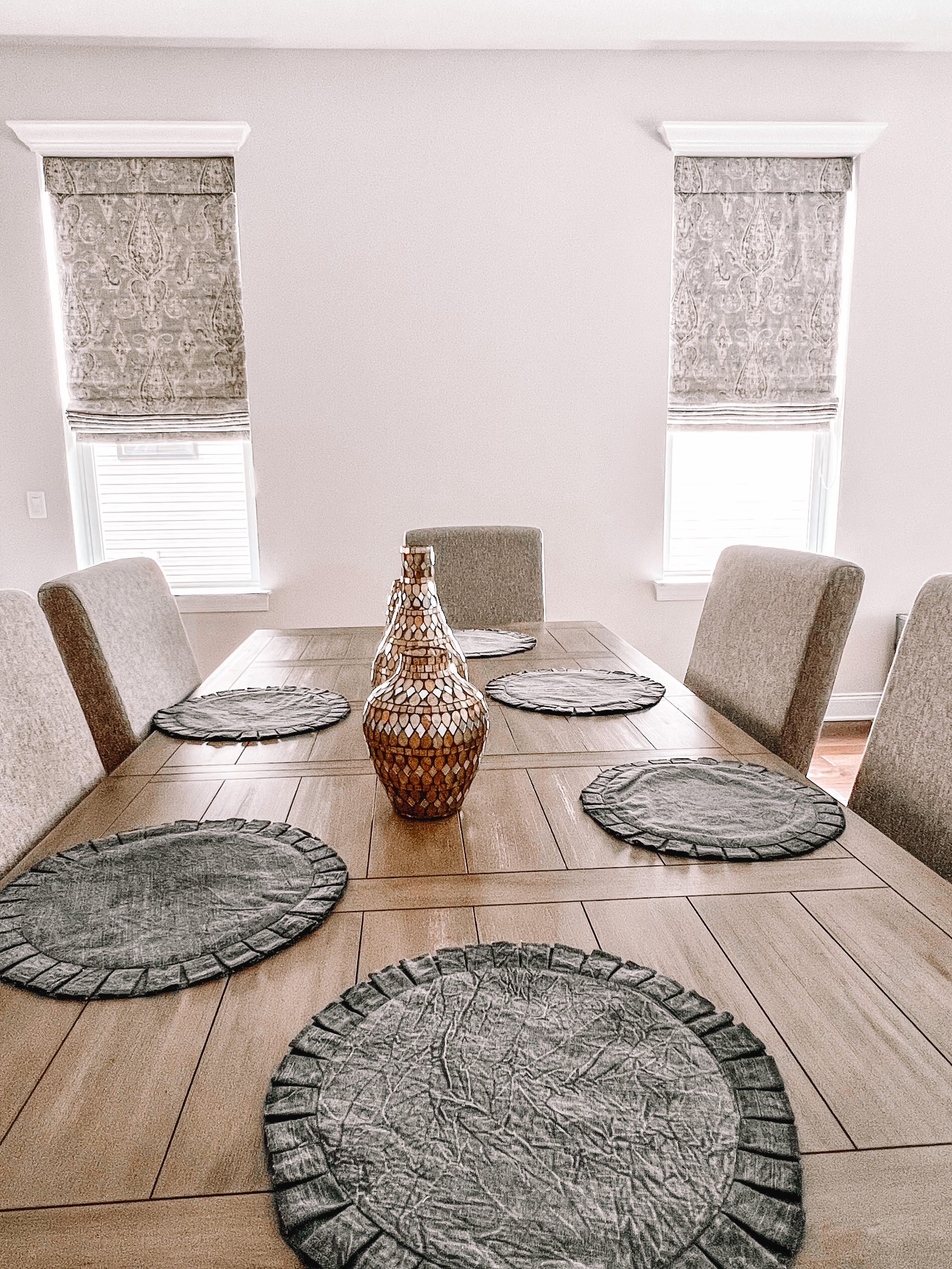 Gorgeous Roman Shades in Clareview Thunder Grey for this dining room in Manalapan, NJ