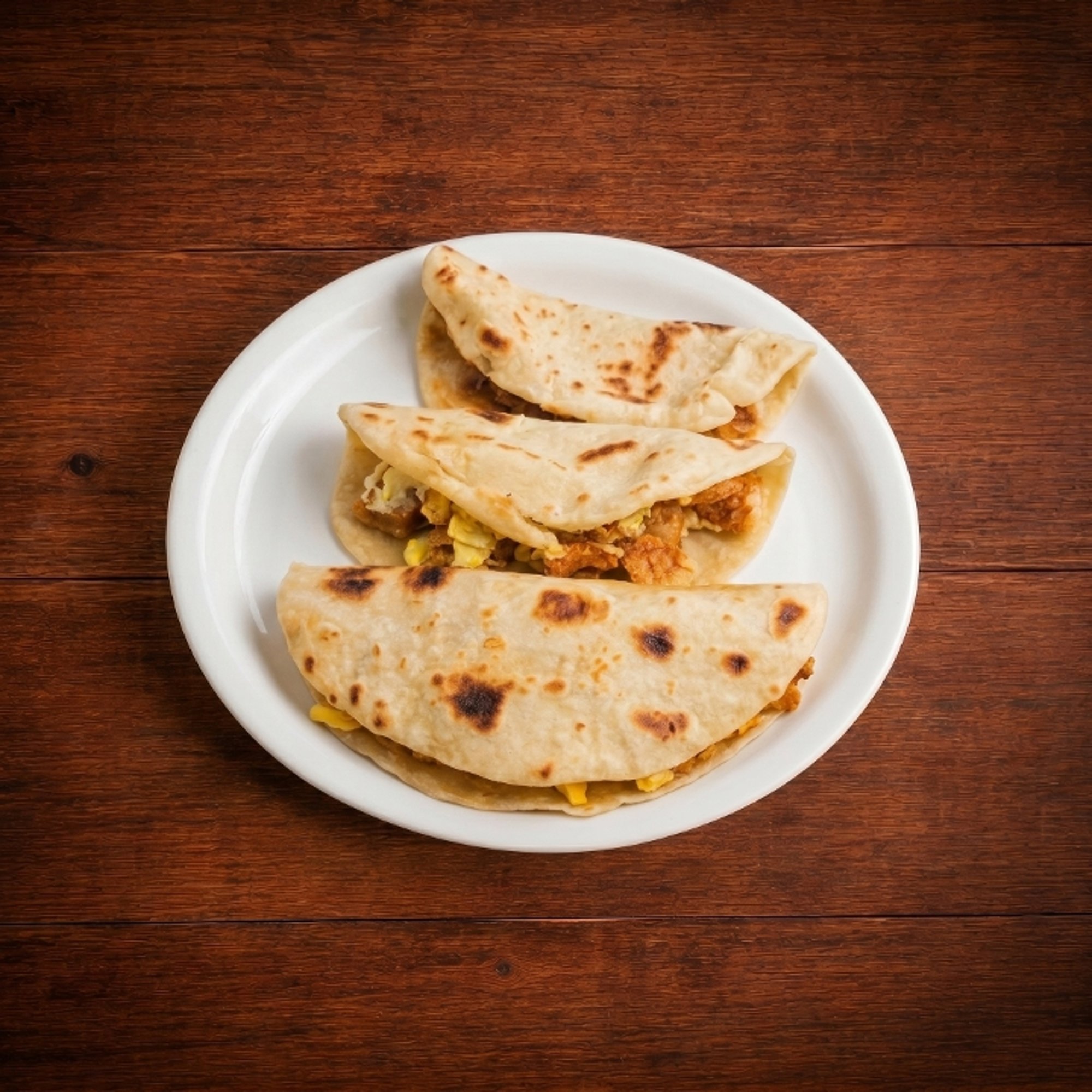 Queso guisado taco