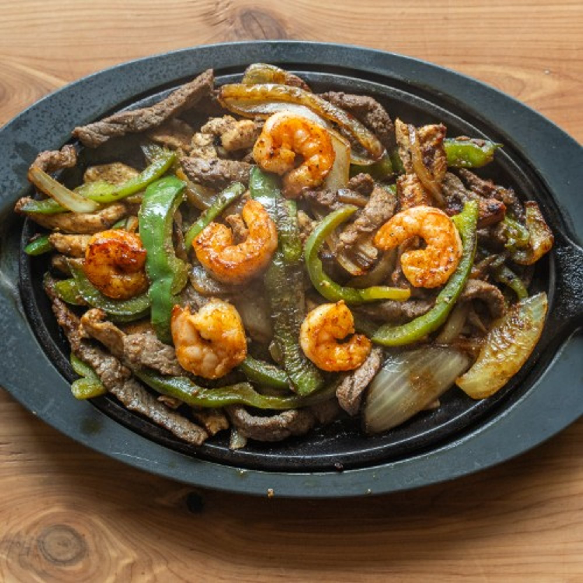 Texas Fajitas Steak, Chicken & Shrimp