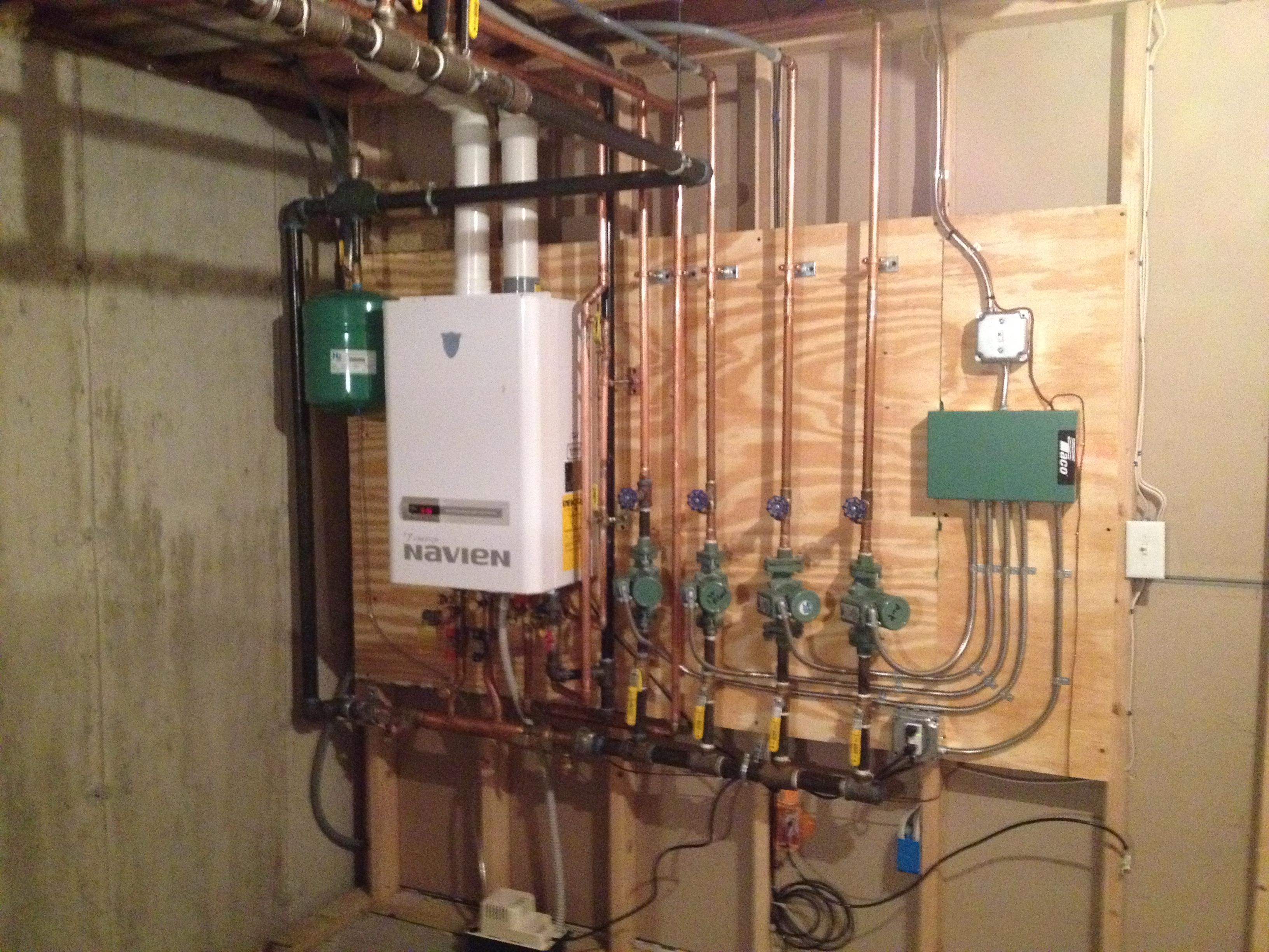We saved our client space and money with the installation of a highly efficient wall hung boiler, in place of her old oil burner!